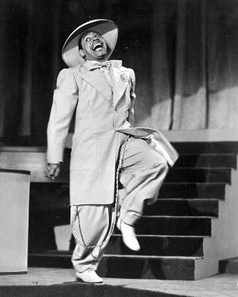Cab Calloway performing on stage.